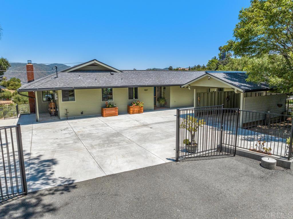 1057 Riverview Drive Fallbrook, CA 92028 - Photo 50 of 69 a view of a house with wooden fence