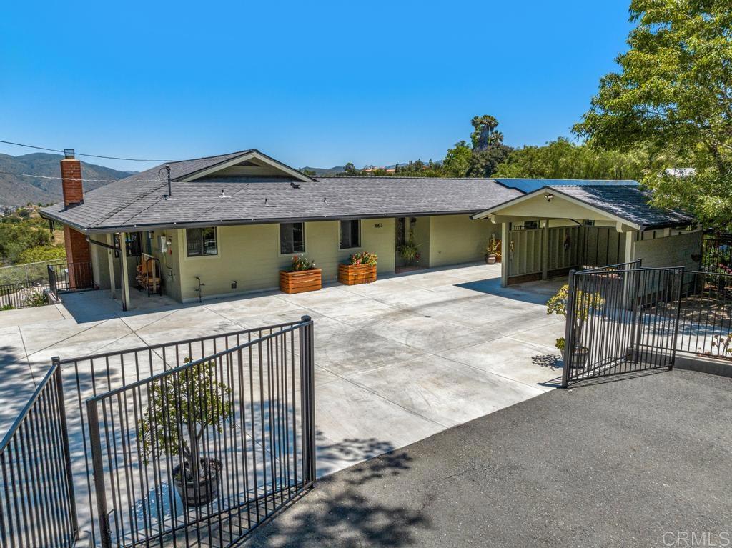 1057 Riverview Drive Fallbrook, CA 92028 - Photo 51 of 69 a view of a house with wooden fence