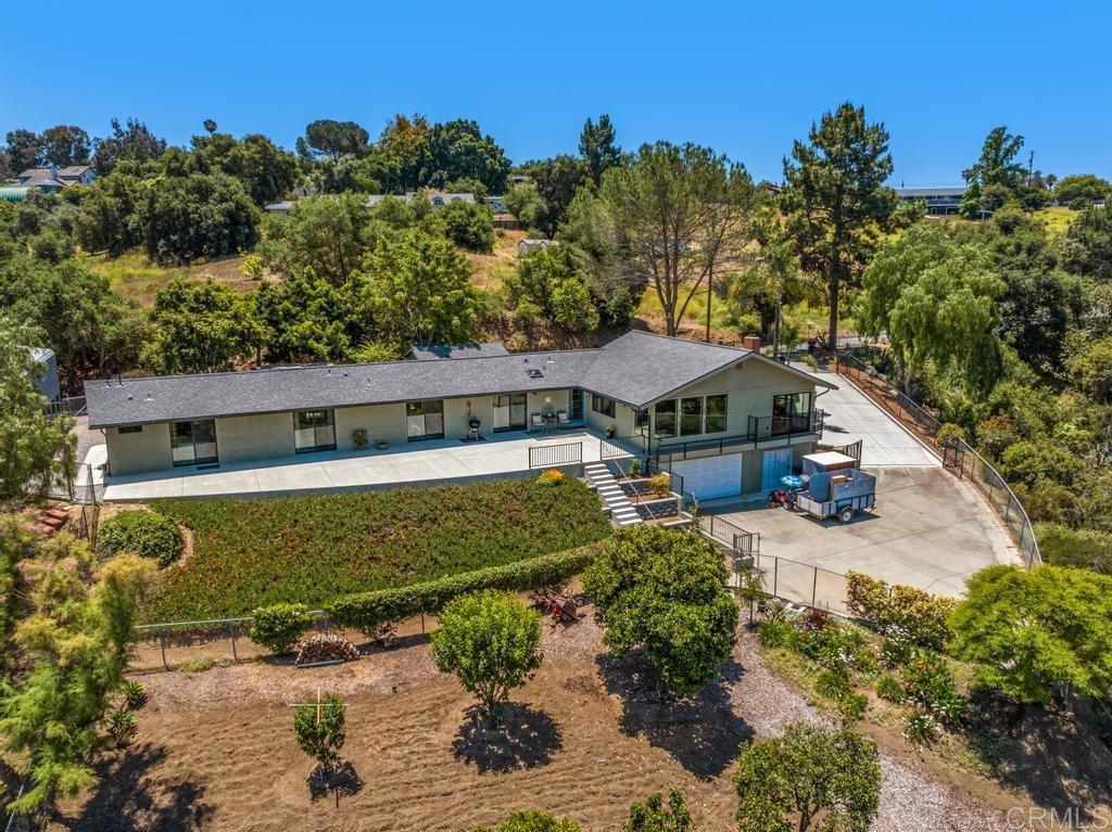 1057 Riverview Drive Fallbrook, CA 92028 - Photo 52 of 69 a view of a house with a yard