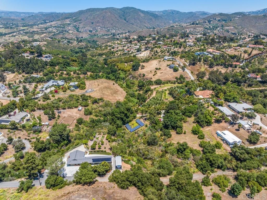 1057 Riverview Drive Fallbrook, CA 92028 - Photo 57 of 69 an aerial view of house with yard and mountain view in back