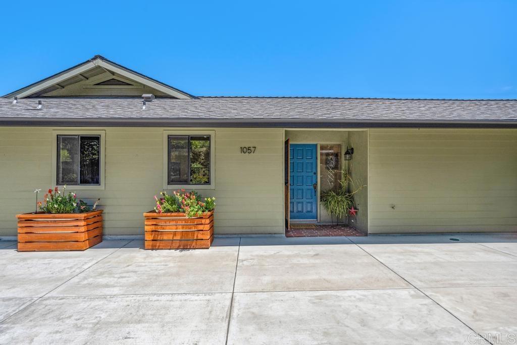 1057 Riverview Drive Fallbrook, CA 92028 - Photo 67 of 69 a front view of a house with a garage