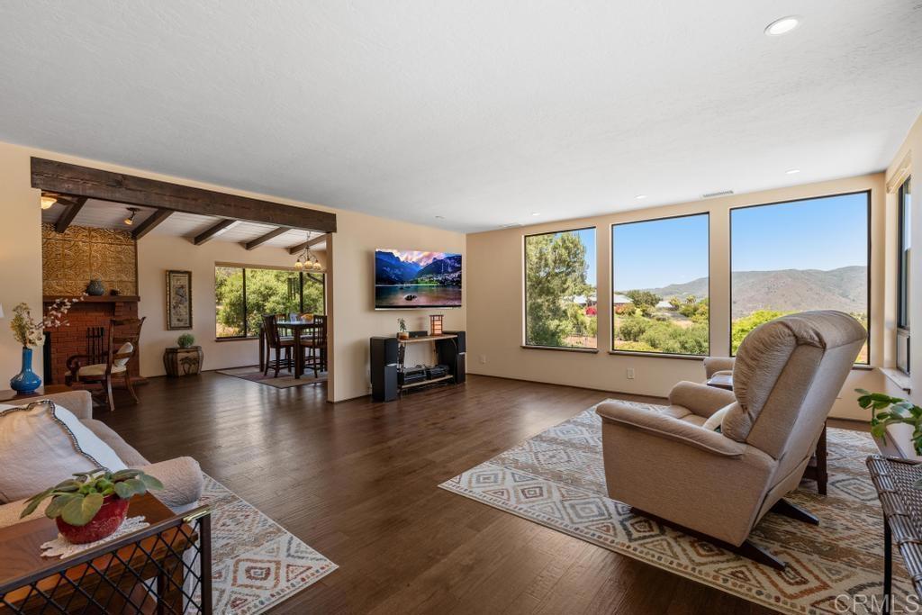 1057 Riverview Drive Fallbrook, CA 92028 - Photo 8 of 69 a living room with furniture and a large window
