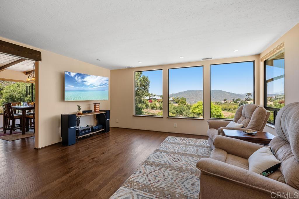 1057 Riverview Drive Fallbrook, CA 92028 - Photo 9 of 69 a living room with furniture and a flat screen tv