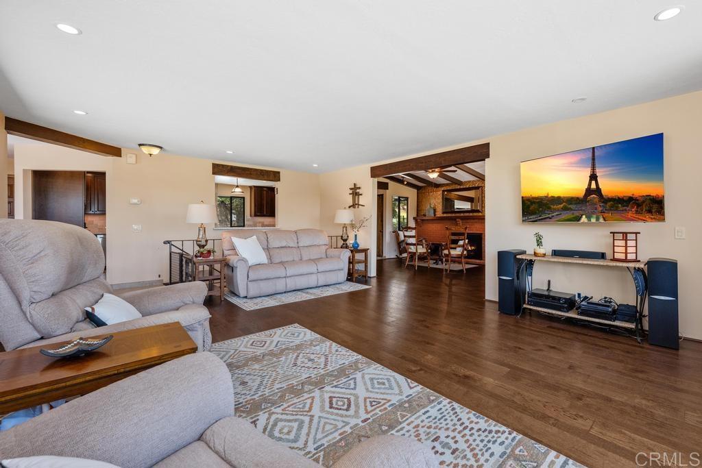1057 Riverview Drive Fallbrook, CA 92028 - Photo 10 of 69 a living room with furniture and a flat screen tv