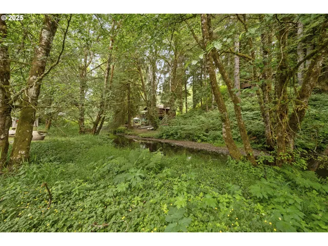a view of a large building with a yard