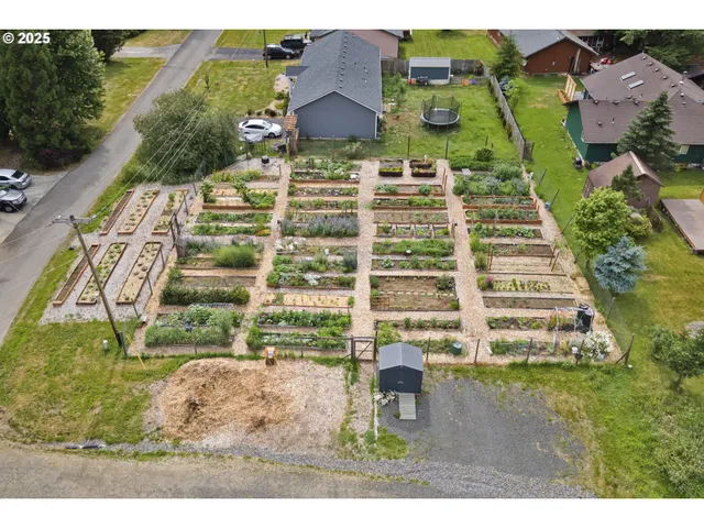 a view of a lake with houses in the back