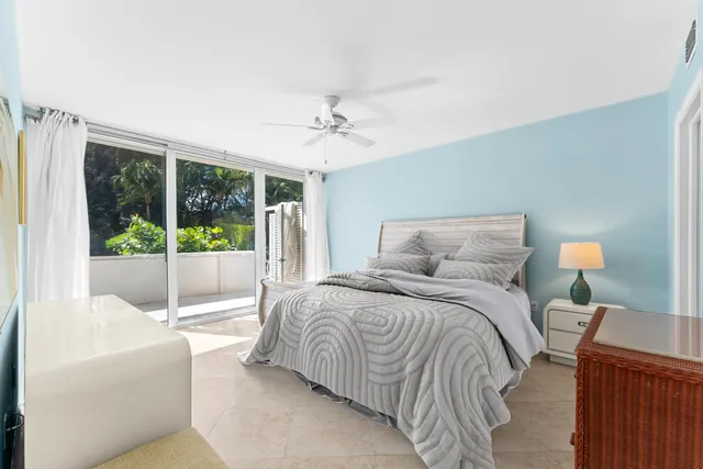 a view of a balcony with a floor and fence