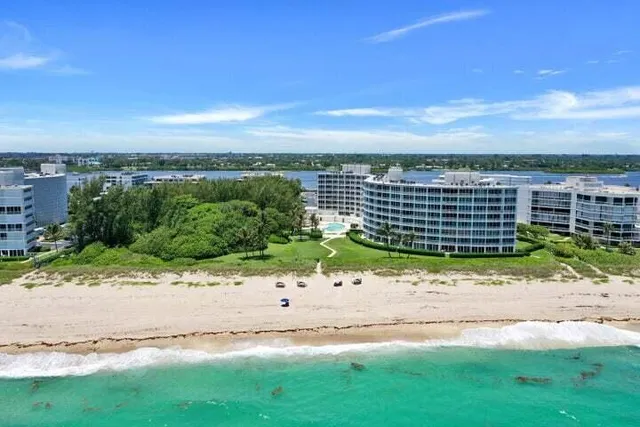 a view of a swimming pool with a patio