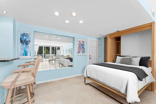 a view of a livingroom with furniture and a table