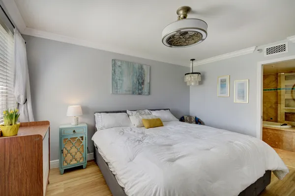 a bathroom with a bathtub and a sink