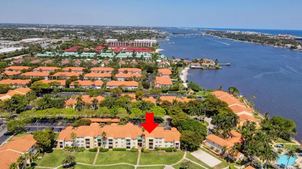 a view of a balcony with furniture and garden