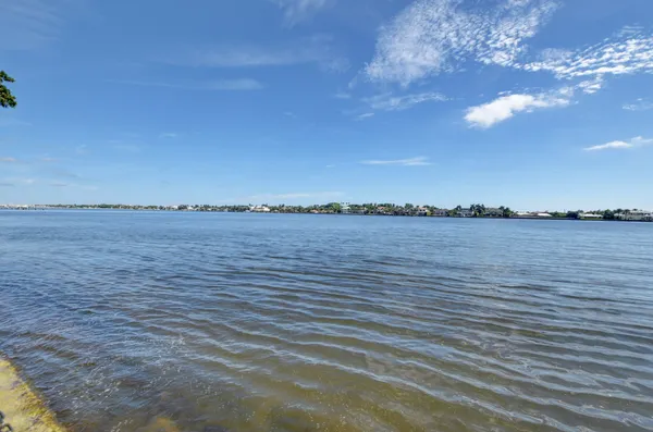 a view of a street with sitting area