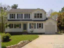 5600 Blacket Court Raleigh, NC 27604 - Photo 1 of 11 a front view of a house with a yard