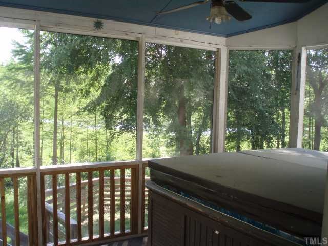5600 Blacket Court Raleigh, NC 27604 - Photo 10 of 11 a view of a porch and garden