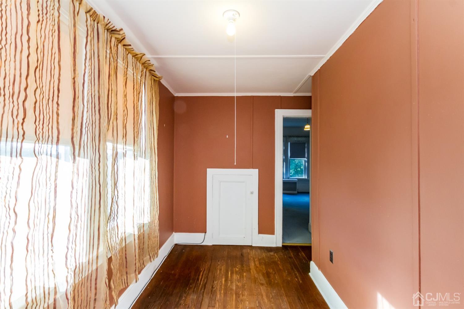 19 Kings Road Netcong, NJ 07857 - Photo 21 of 24 a view of a hallway with wooden floor and staircase