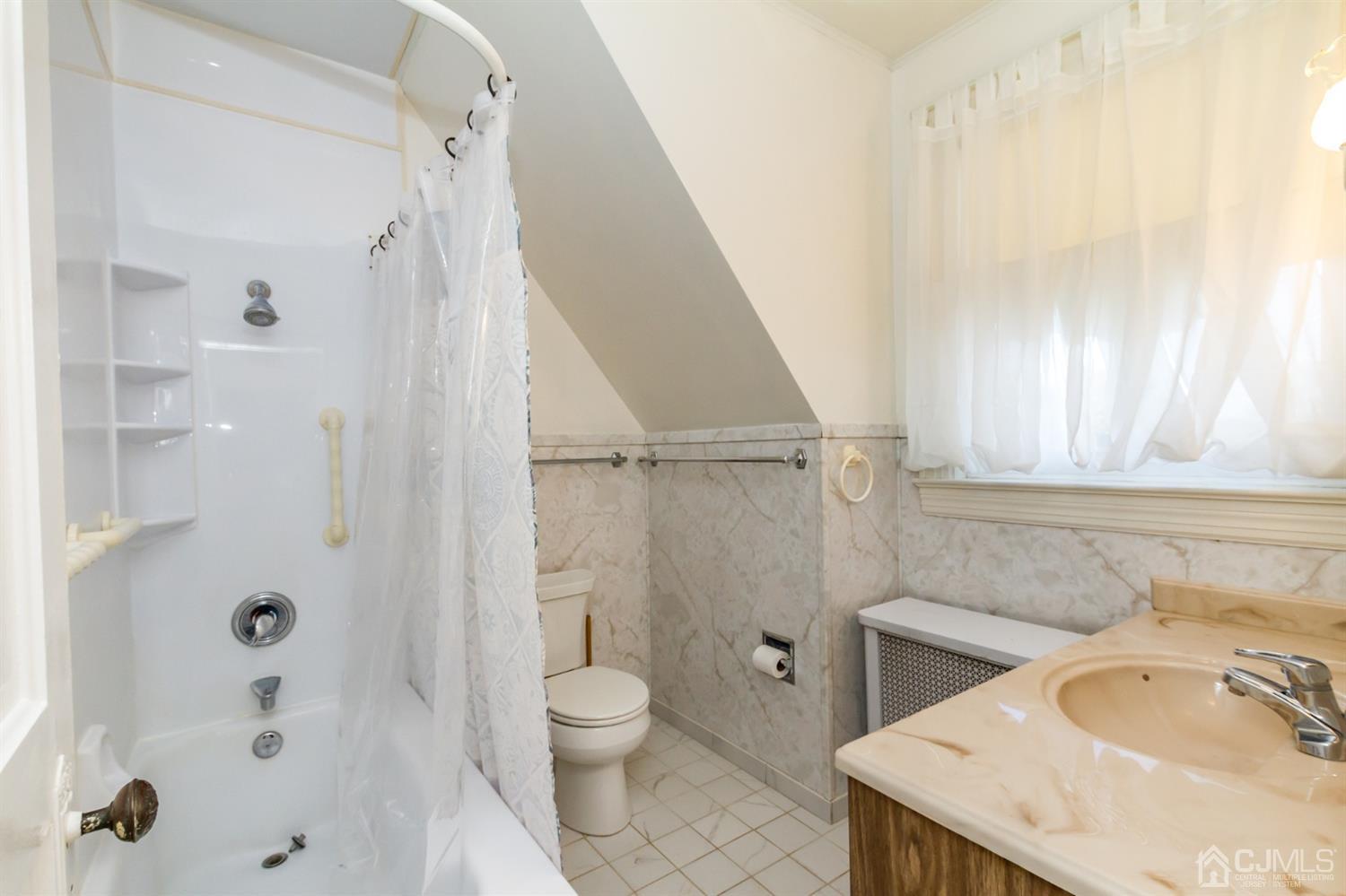 19 Kings Road Netcong, NJ 07857 - Photo 22 of 24 a bathroom with a sink a toilet and shower
