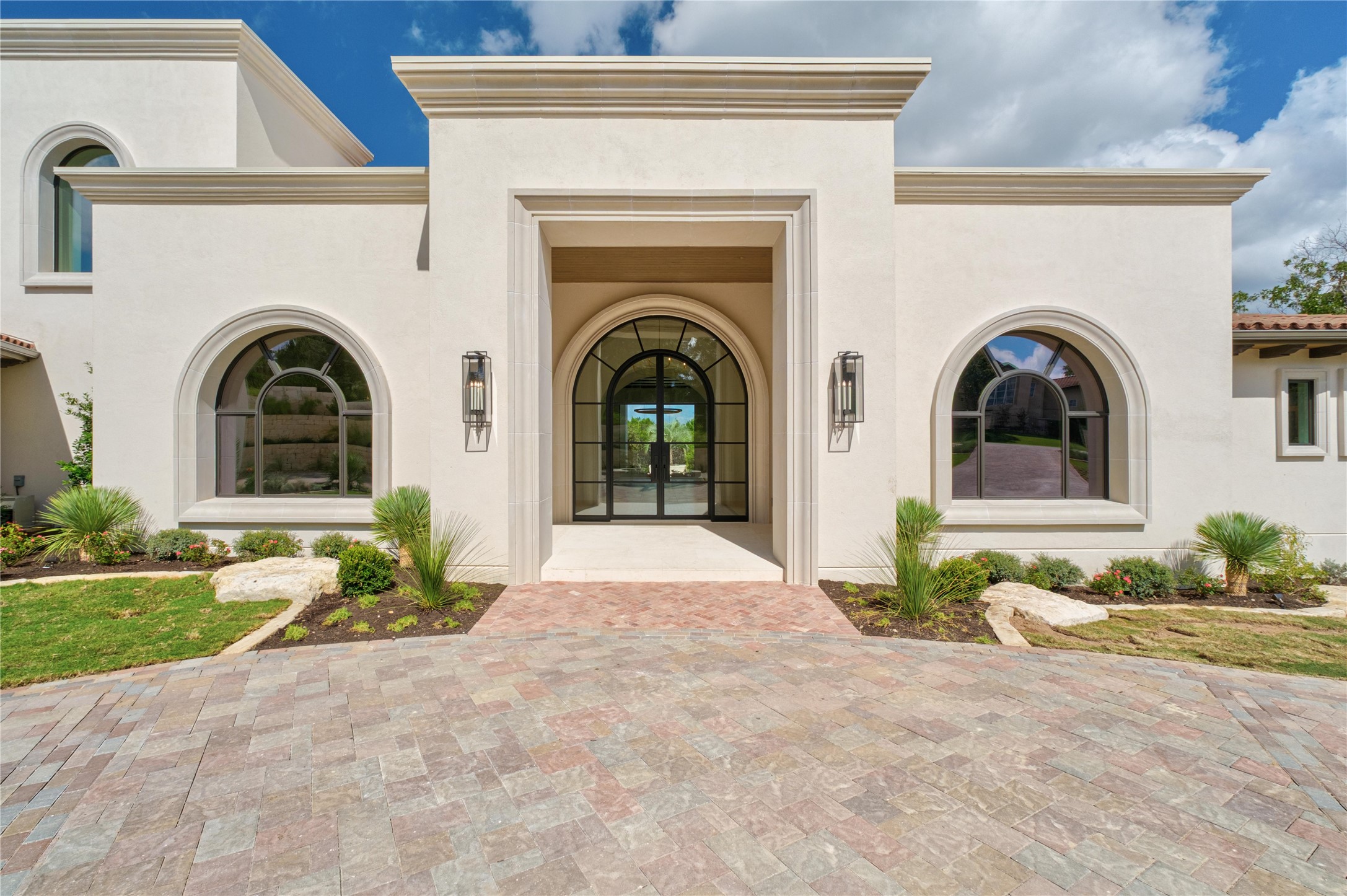 1104 Marly Way Austin, TX 78733 - Photo 2 of 13 a view of a house with a porch