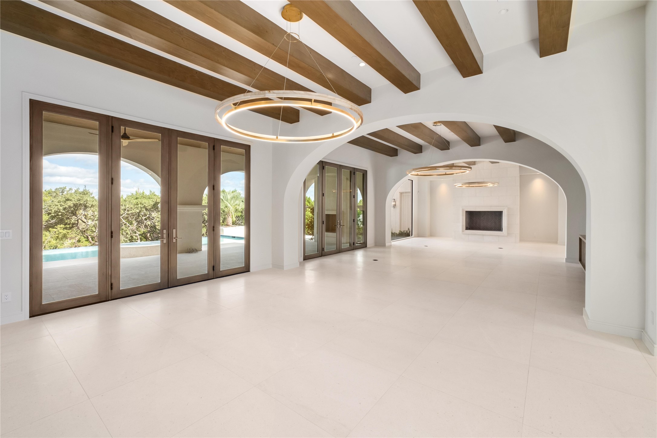 1104 Marly Way Austin, TX 78733 - Photo 4 of 13 a view of an entryway with a floor to ceiling window