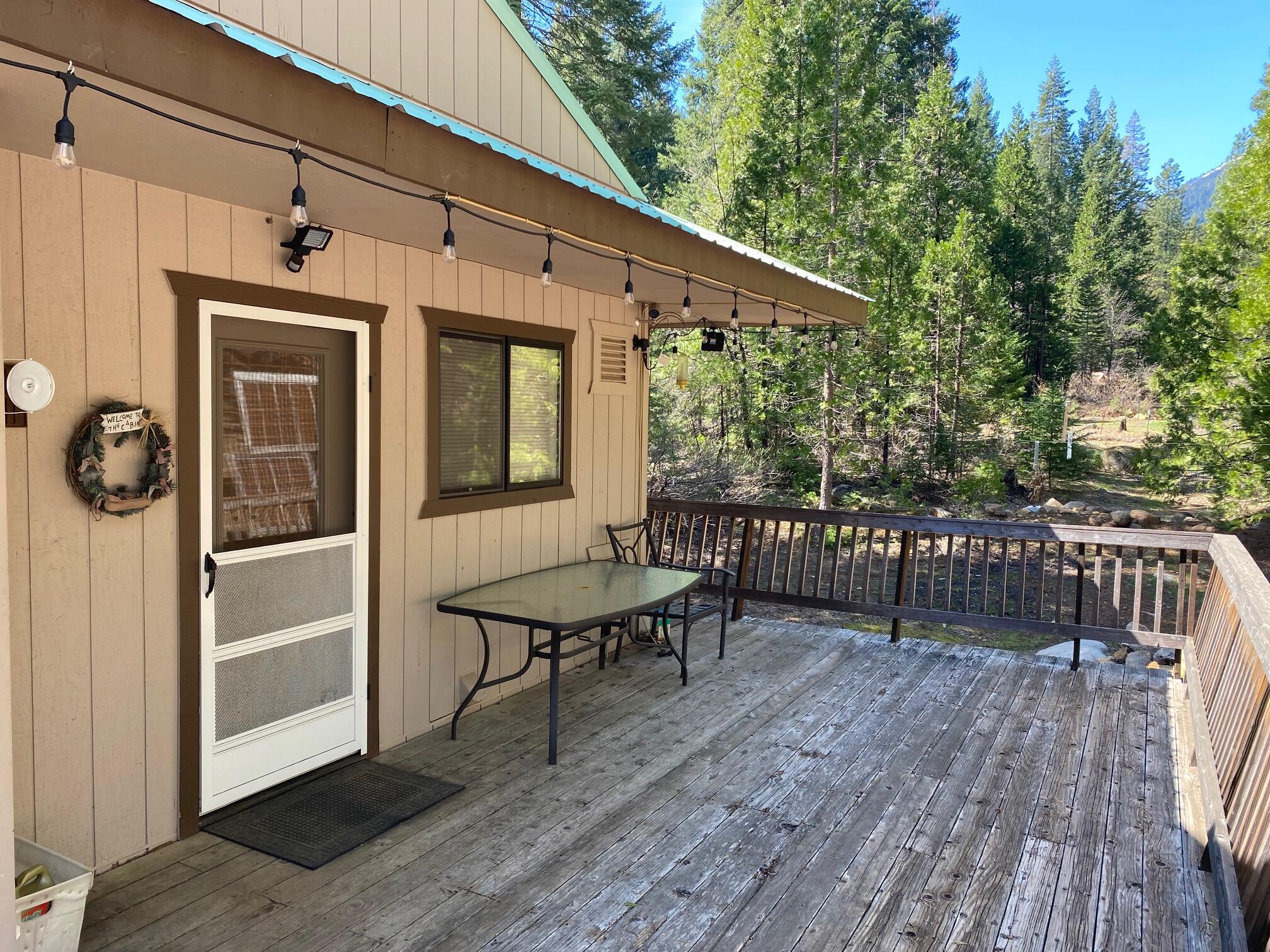 581 Mountain Aire Road Trinity Center, CA 96091 - Photo 2 of 48 Front deck of main house