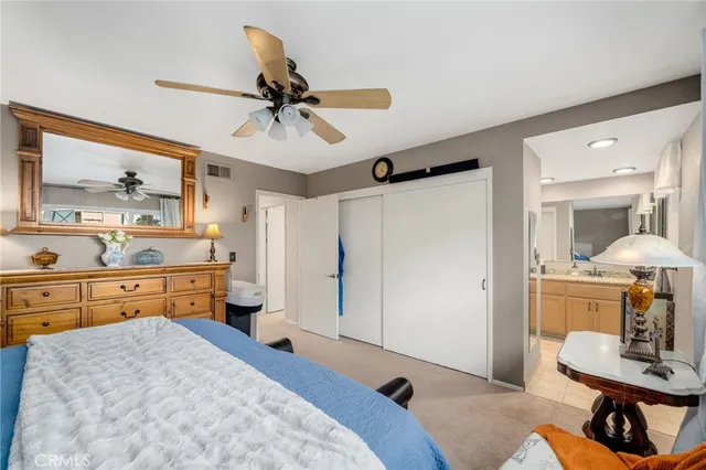 a bed room with a bed and furniture