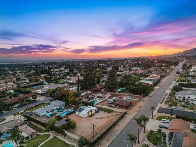 an aerial view of city and lake