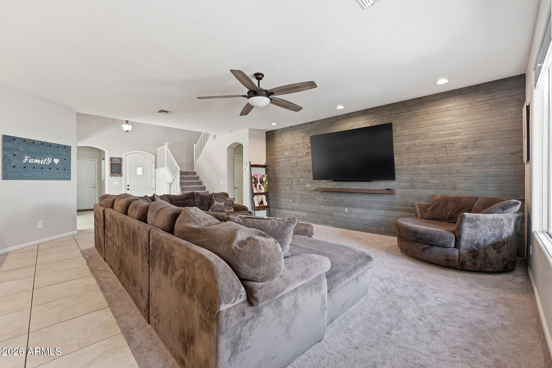 3273 East Fairview Street Gilbert, AZ 85295 - Photo 11 of 37 a living room with furniture and a flat screen tv