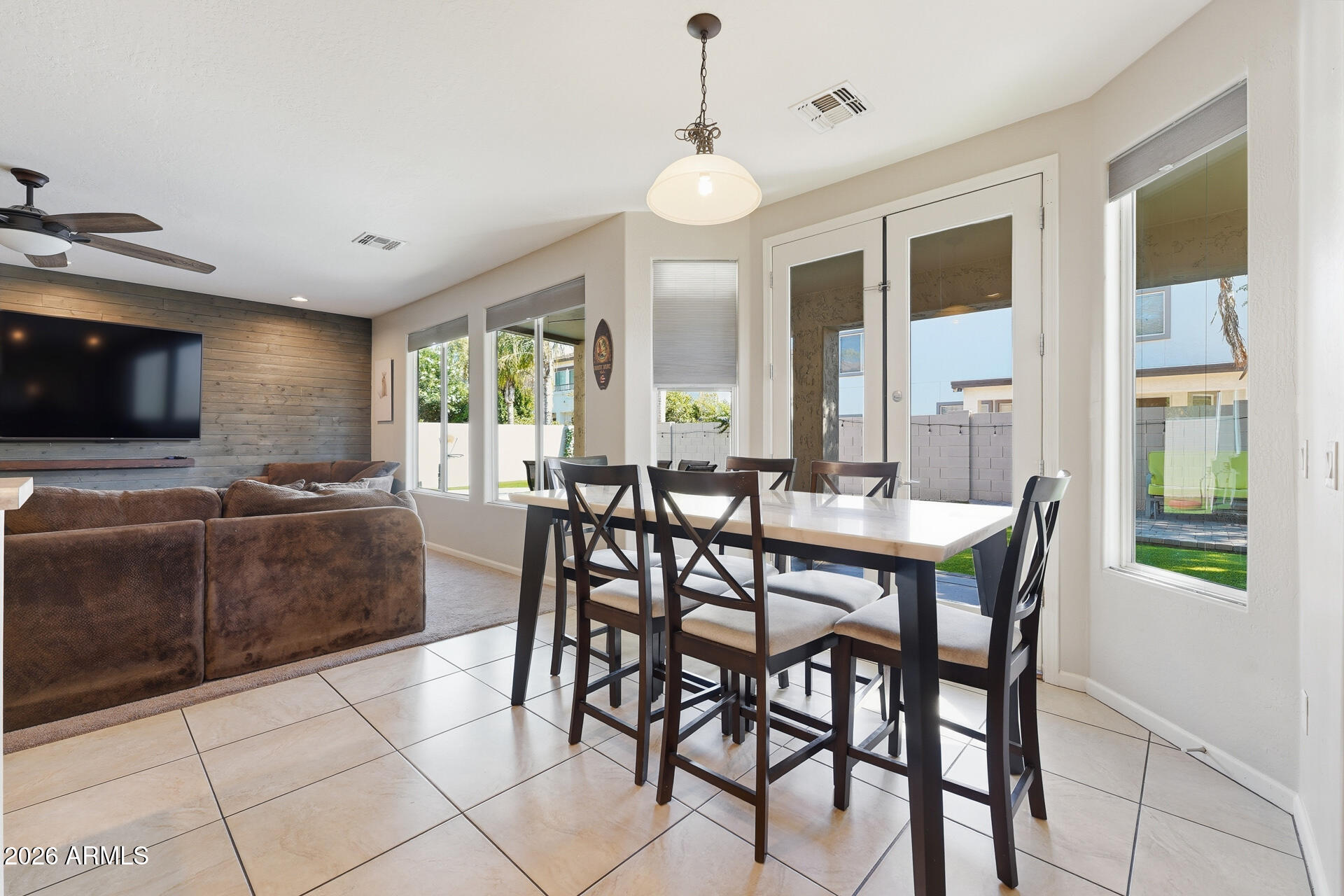 3273 East Fairview Street Gilbert, AZ 85295 - Photo 18 of 37 a view of a dining room with furniture window and outside view