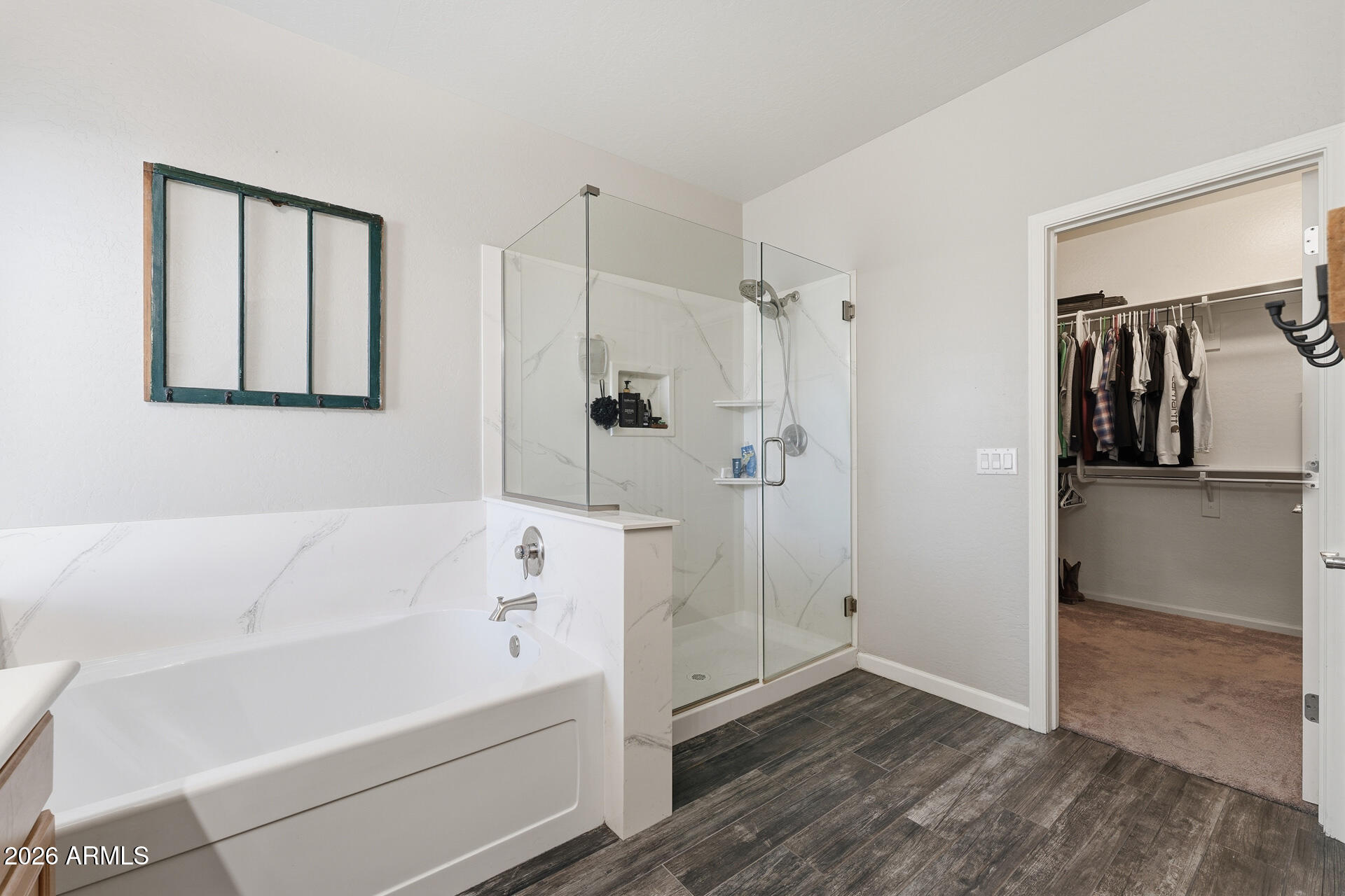 3273 East Fairview Street Gilbert, AZ 85295 - Photo 27 of 37 a bathroom with a bathtub and a shower