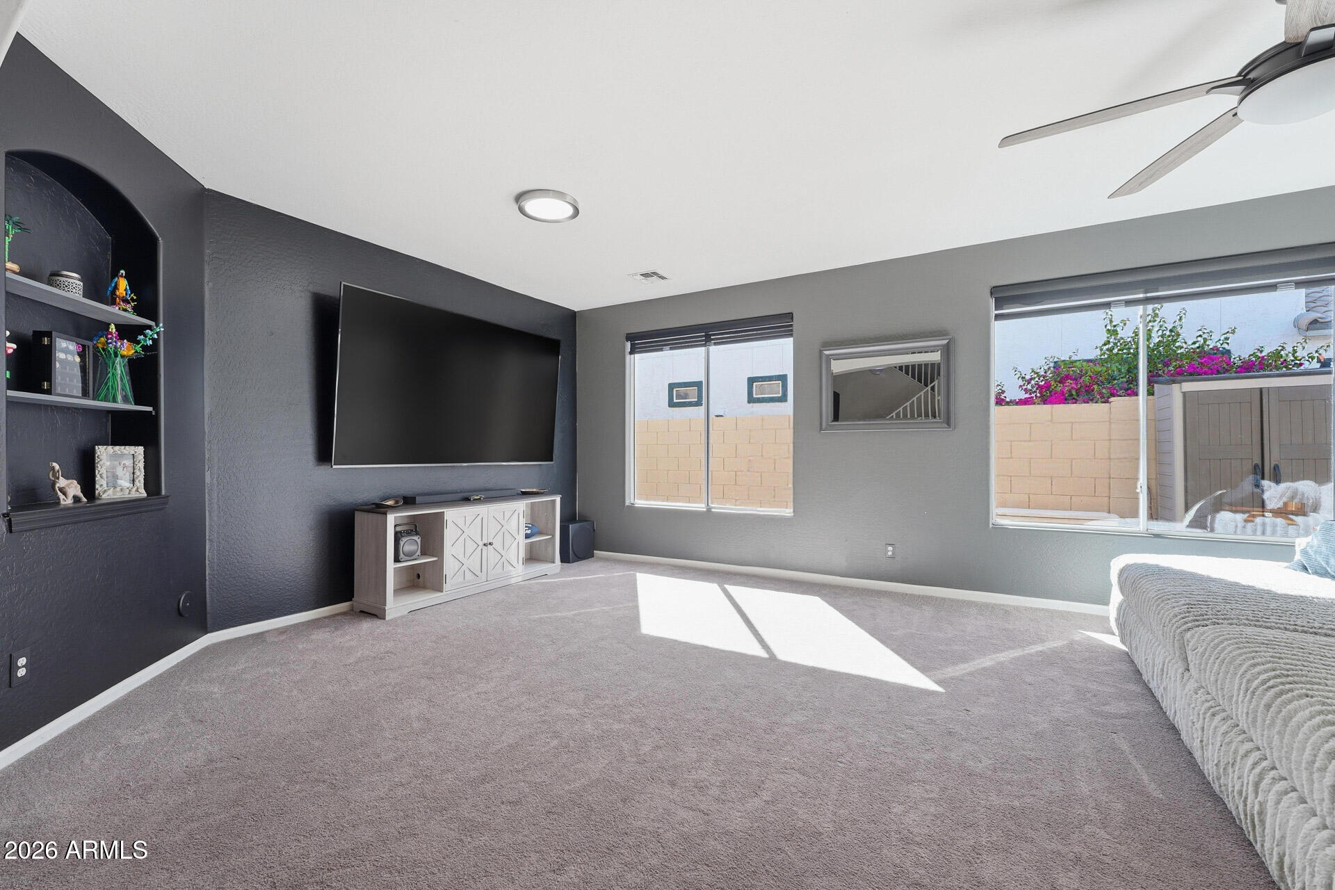 3273 East Fairview Street Gilbert, AZ 85295 - Photo 6 of 37 a living room with furniture and a flat screen tv