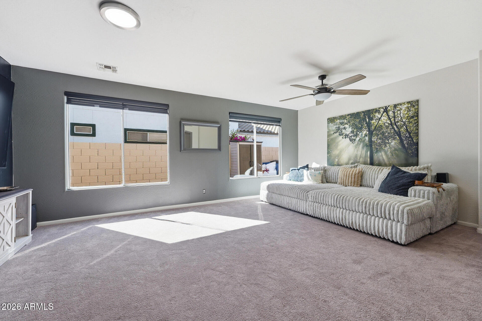 3273 East Fairview Street Gilbert, AZ 85295 - Photo 7 of 37 a living room with furniture and a large window