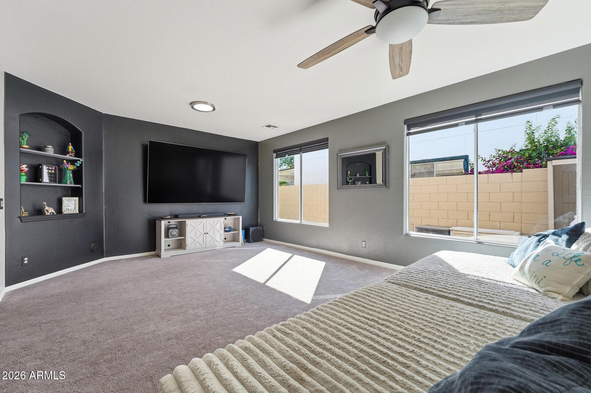 3273 East Fairview Street Gilbert, AZ 85295 - Photo 8 of 37 a bedroom with a bed and a flat screen tv