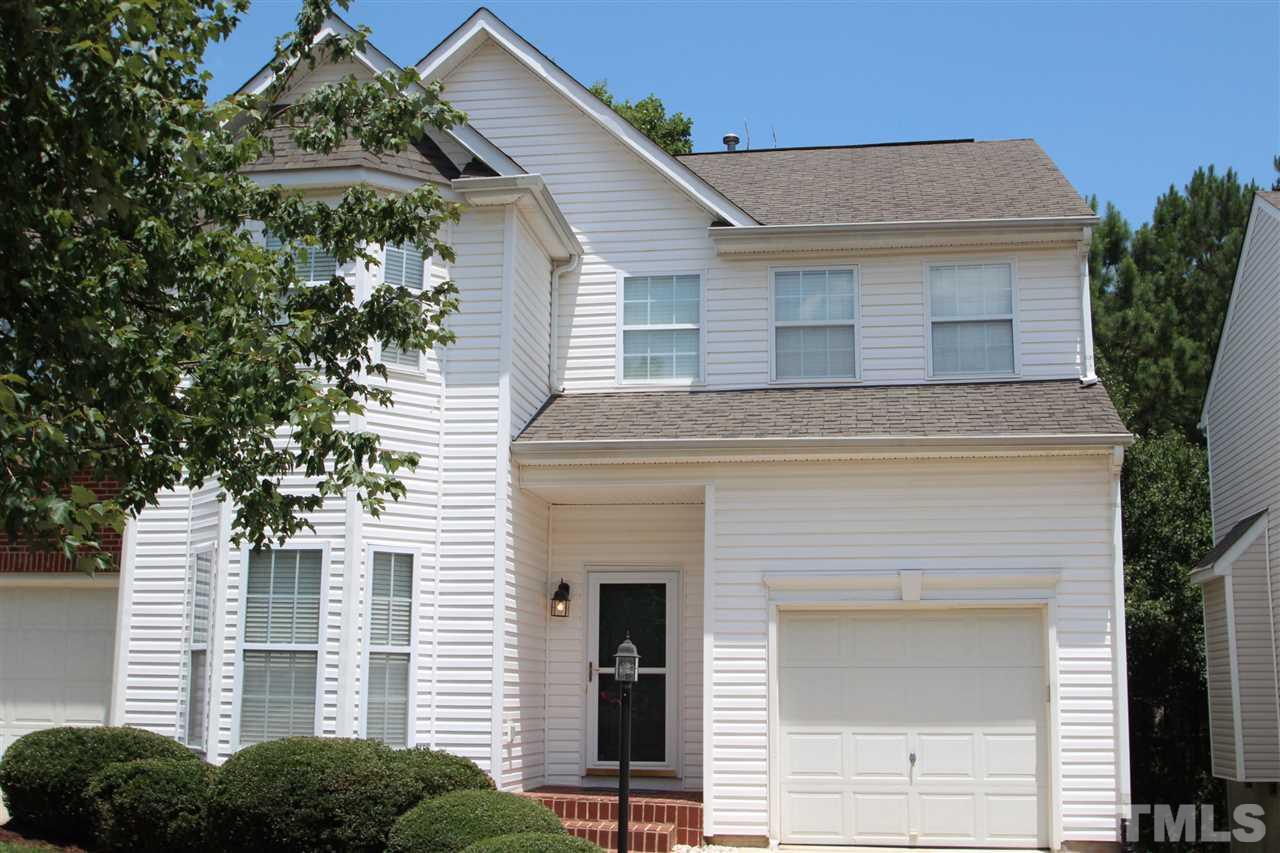 5312 Arete Way Raleigh, NC 27607 - Photo 1 of 20 a view of a house with brick walls and windows