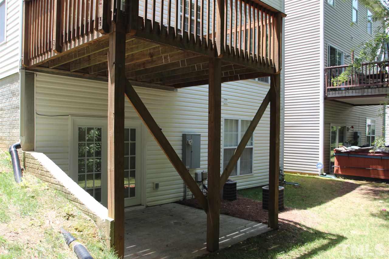 5312 Arete Way Raleigh, NC 27607 - Photo 19 of 20 a view of a house with backyard and wooden fence