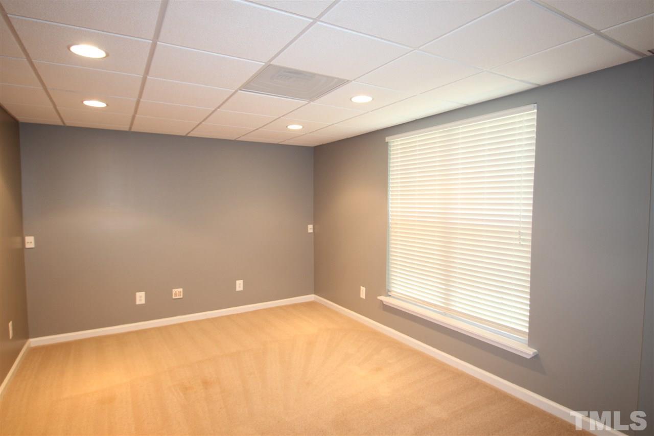 5312 Arete Way Raleigh, NC 27607 - Photo 8 of 20 an empty room with windows