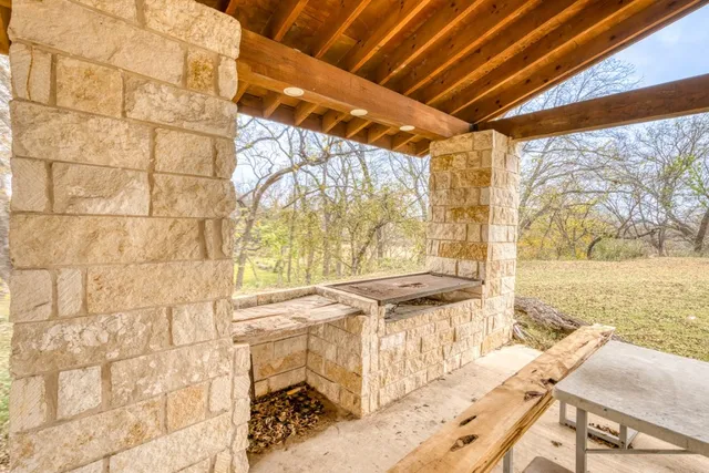 a view of yard with large tree
