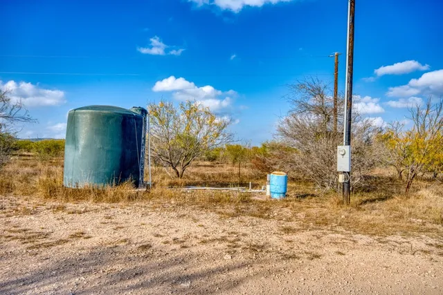 a view of an ocean and mountain