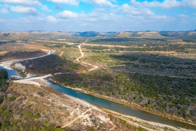 a view of an ocean and mountain