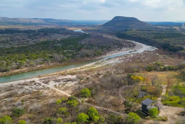 a view of a lake with mountains in the background
