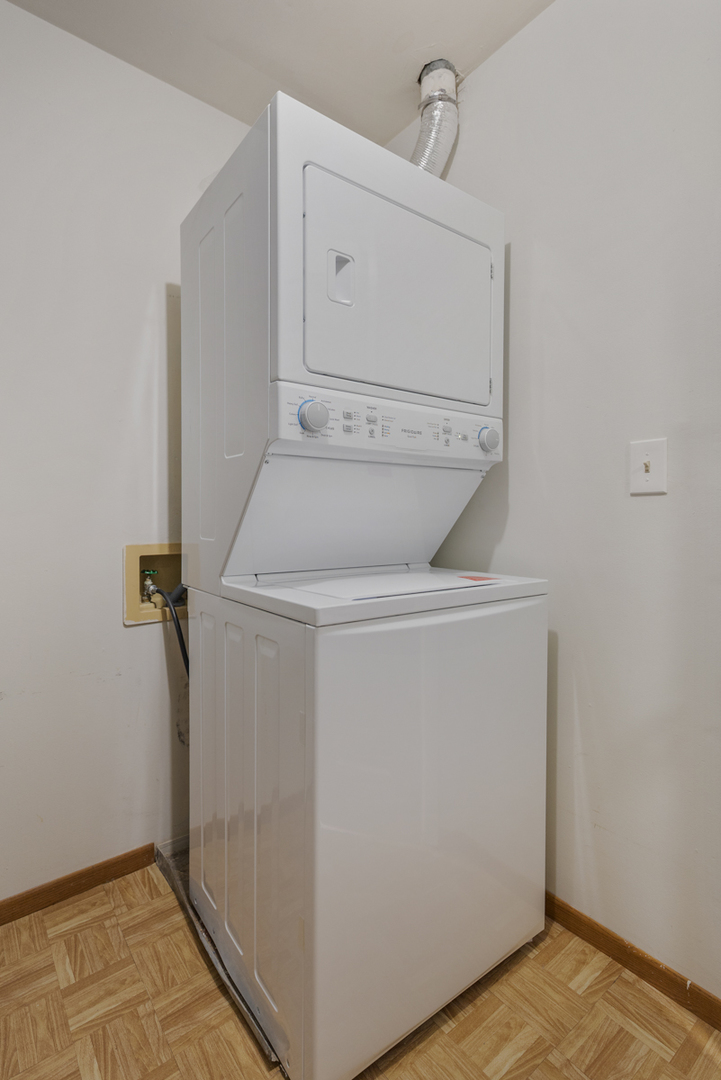 47 Gant Circle, Unit E Streamwood, IL 60107 - Photo 16 of 21 a utility room with dryer and washer