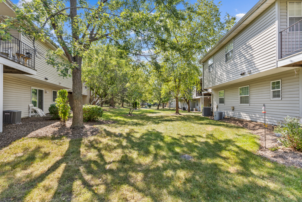 47 Gant Circle, Unit E Streamwood, IL 60107 - Photo 9 of 21 a view of outdoor space yard and tree