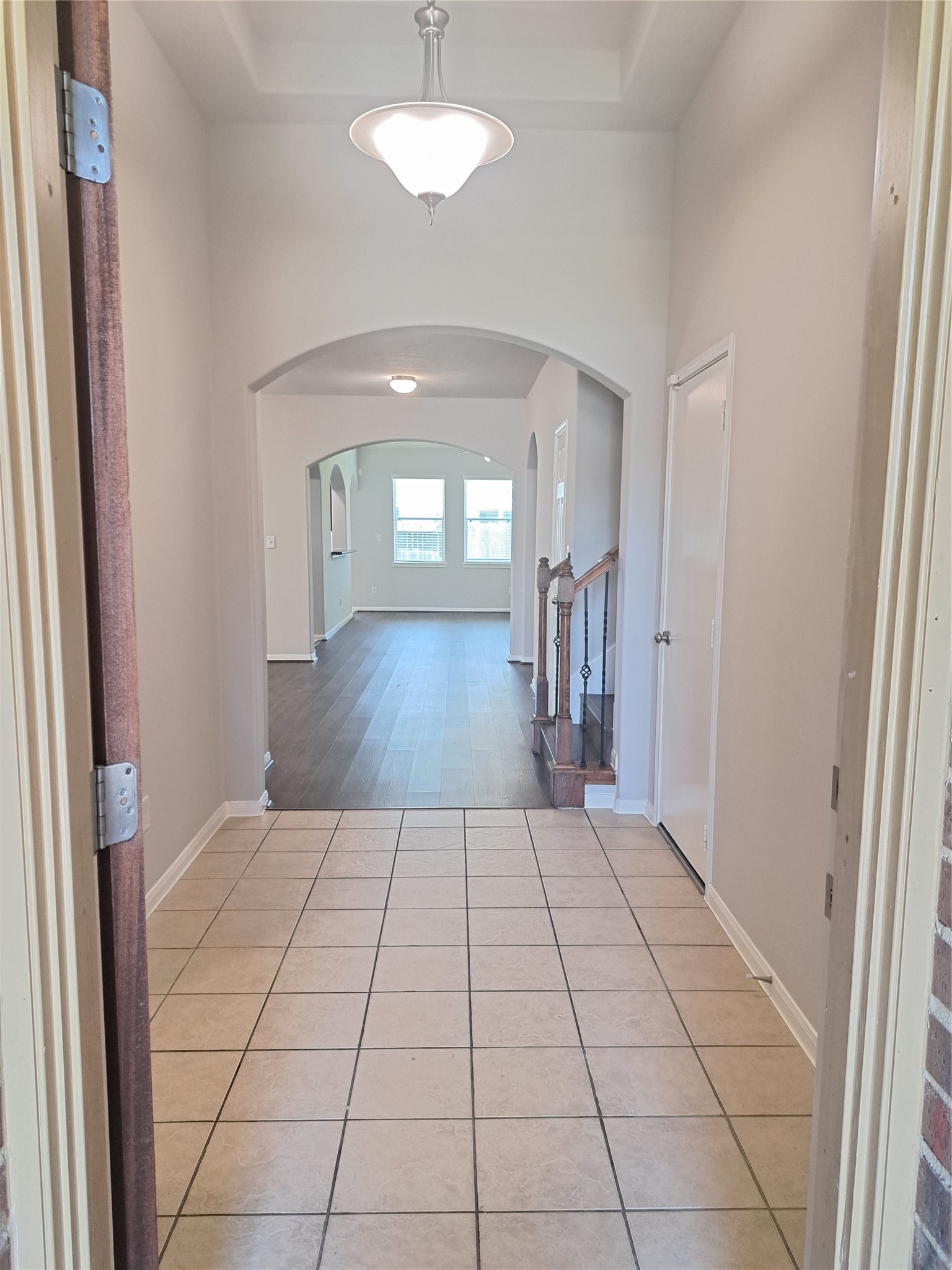26315 Fox Ridge Lane Katy, TX 77494 - Photo 3 of 39 wooden floor in a hall with a window