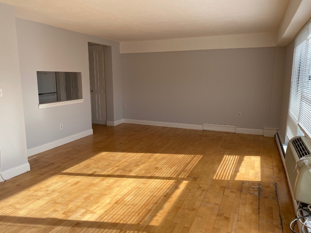 4 Trowbridge Place, Unit 3B Cambridge, MA 02138 - Photo 7 of 11 a view of wooden floor