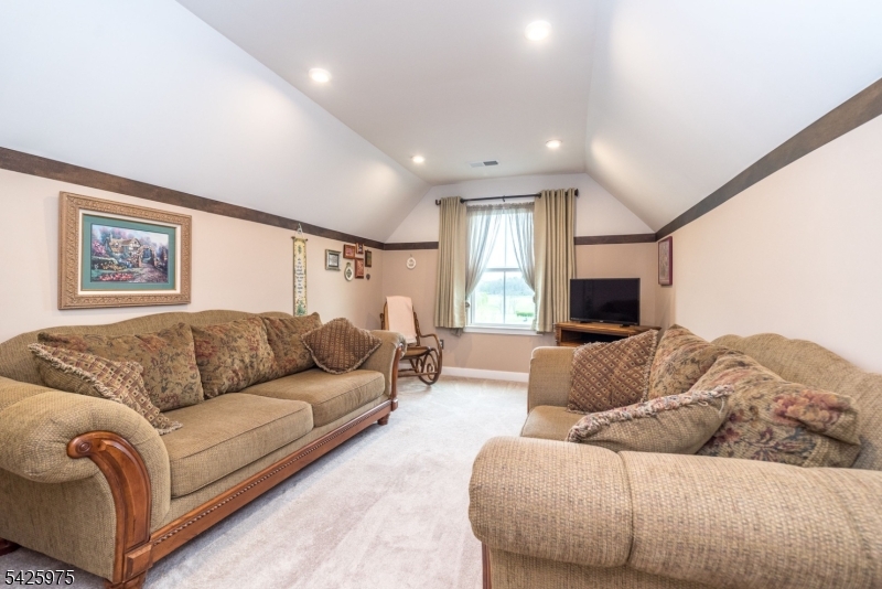 2 Sharp Shinned Court Washington, NJ 07882 - Photo 25 of 27 a living room with furniture and a large window