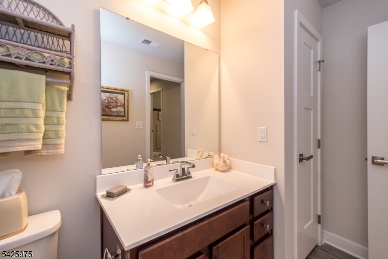 2 Sharp Shinned Court Washington, NJ 07882 - Photo 26 of 27 a bathroom with a sink and a mirror