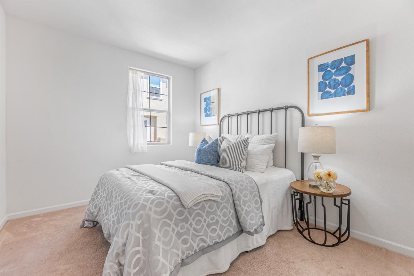 1926 Trento Loop Milpitas, CA 95035 - Photo 11 of 43 a bedroom with a bed and window