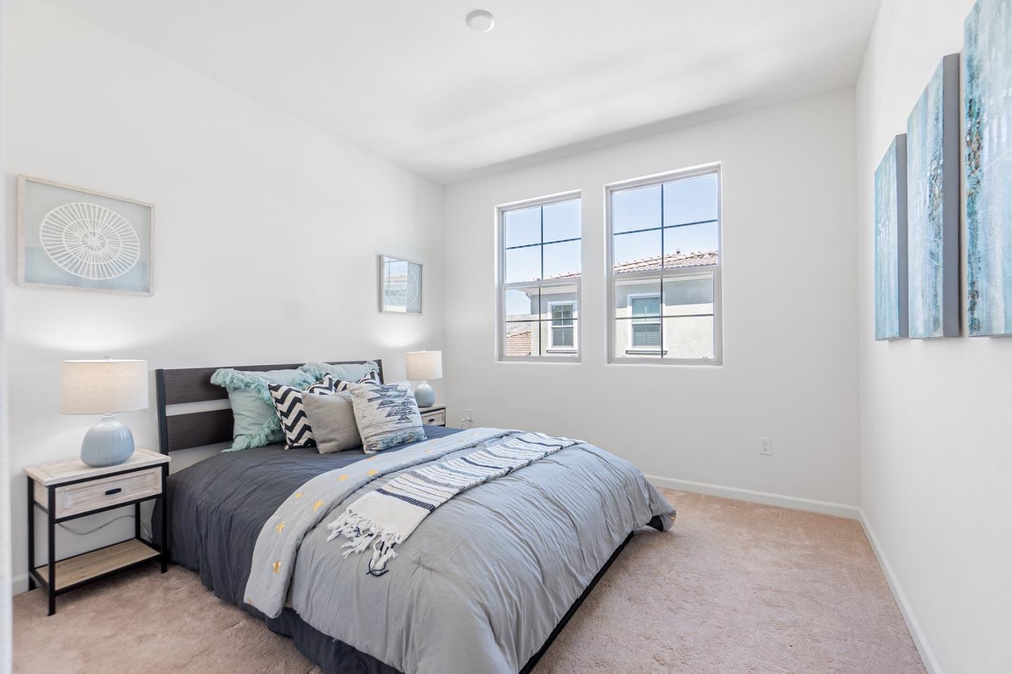 1926 Trento Loop Milpitas, CA 95035 - Photo 16 of 43 a large bed sitting in a bedroom next to a window