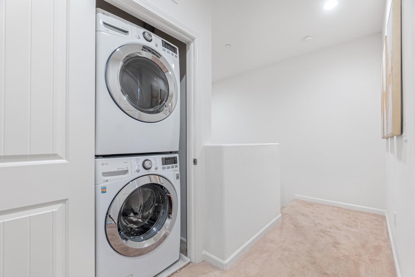 1926 Trento Loop Milpitas, CA 95035 - Photo 25 of 43 a utility room with dryer and washer