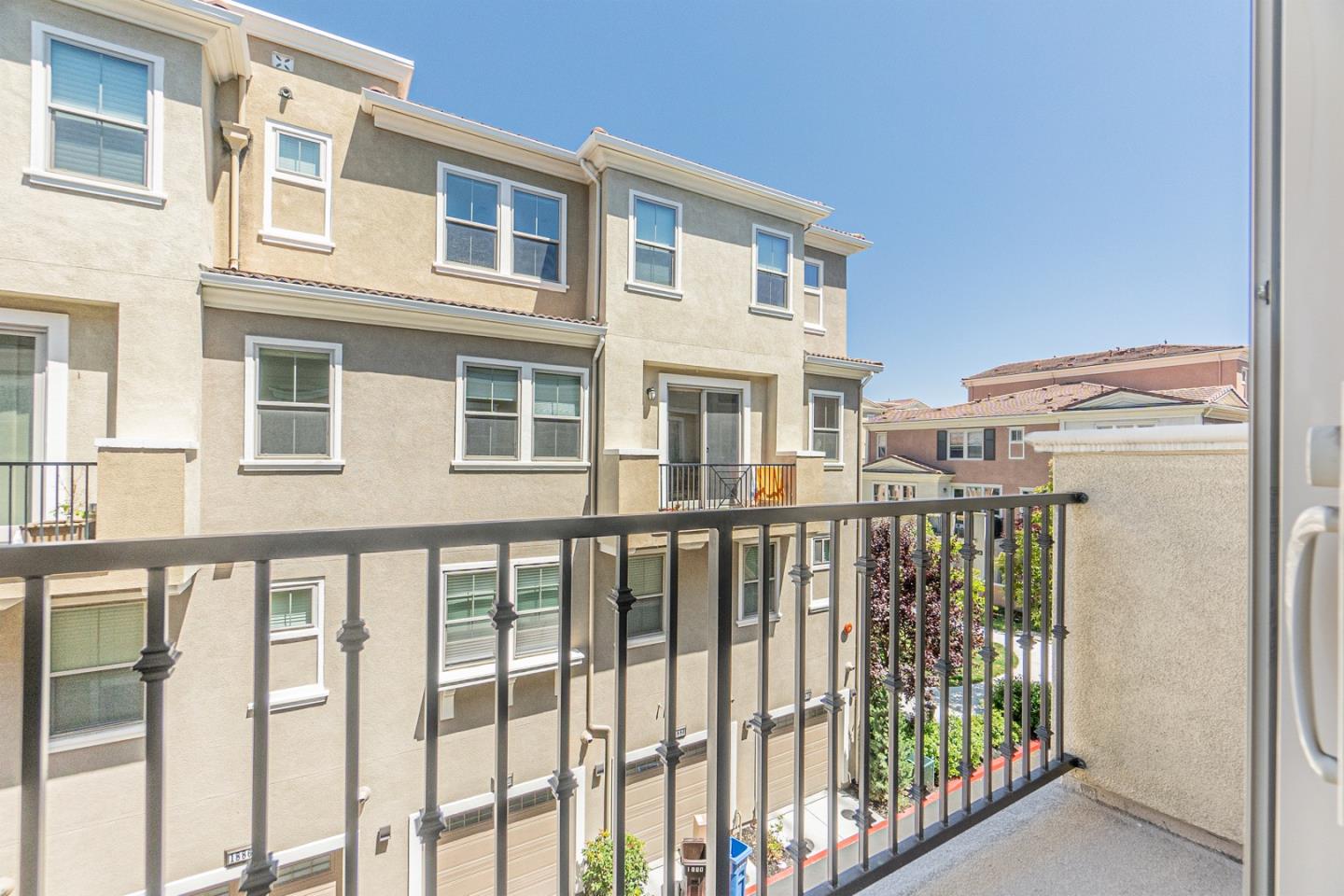 1926 Trento Loop Milpitas, CA 95035 - Photo 28 of 43 a view of a large building from a balcony