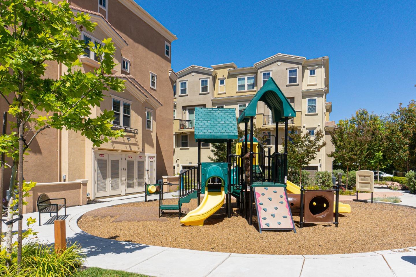 1926 Trento Loop Milpitas, CA 95035 - Photo 36 of 43 a building outdoor space with glass windows and yard