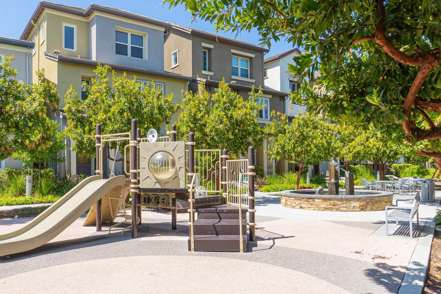 1926 Trento Loop Milpitas, CA 95035 - Photo 39 of 43 a view of a brick building with many windows